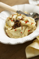 Dumplings with chili and fried onion