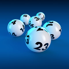 Lottokugeln auf blauem Hintergrund - 6 Richtige im Lotto