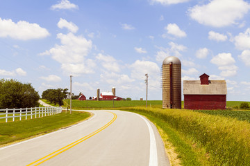 Countryside Road With Old Barn And Big Farm