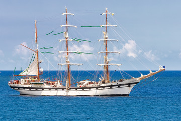 Fototapeta na wymiar Sailing ship on a calm blue sea