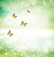 Obraz na płótnie Canvas Butterflies on fantasy lake