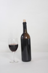 Bottle and Glass of Red Wine