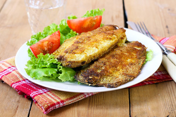 Fried mackerel on plate