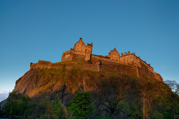 Obraz premium Edinburgh castle at sunset, Scotland, UK
