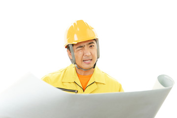 疲れた表情の作業員