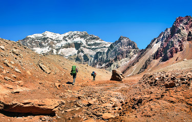 Naklejka premium Hikers trekking in the Andes, Argentina, South America