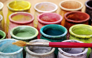 Old brush and colorful bottles