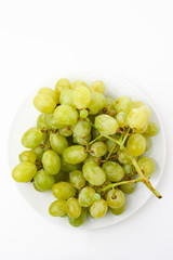 Grapes on a white plate