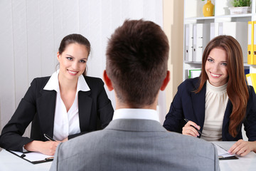 Job applicants having interview