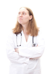 Young female physician cross-armed thinking about something