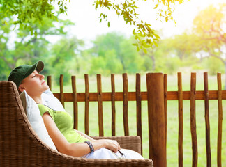 Cute girl resting on veranda