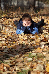 children in autumn leaf