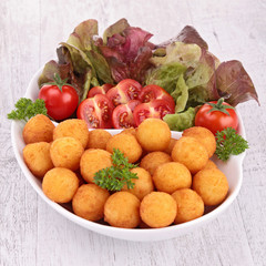 fried potato ball with salad