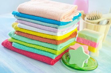 Obraz na płótnie Canvas Assortment of soap and towels