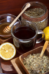 Tea cup with lemon and honey