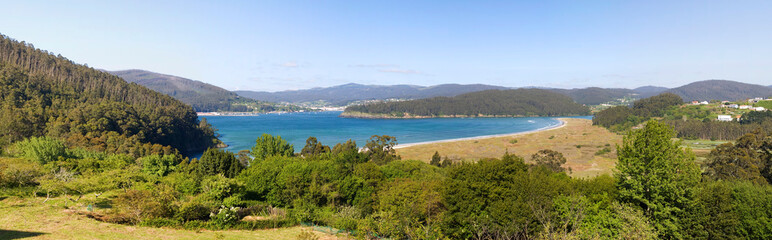 Fototapeta na wymiar Panoramic landscape with beach in a sunny day