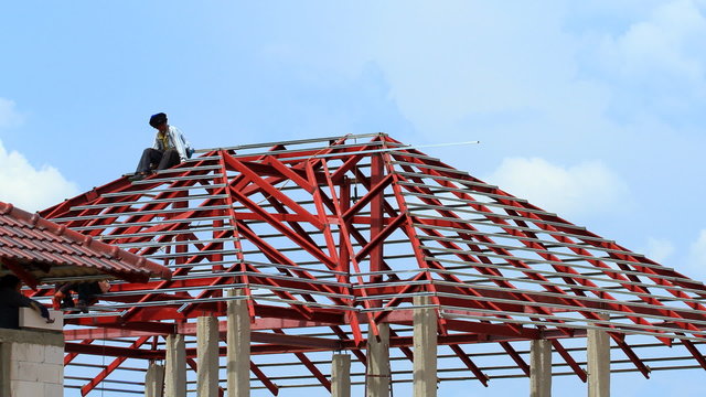 Time lapse,worker build a roof construction.