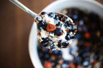 Blueberries with nuts, seeds and yoghurt for breakfast