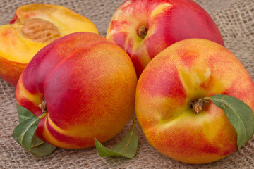 fresh nectarine or peach on wooden  background