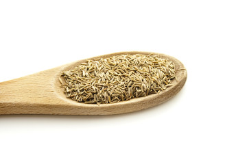 Kümmel auf Kochlöffel