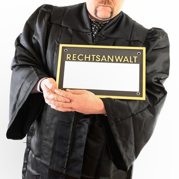 Lawyer in Robe with sign blank