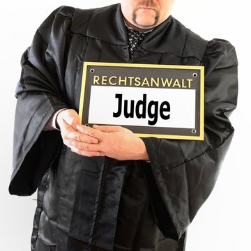 Lawyer in Robe with sign