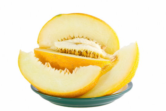 image of yellow ripe melon on a plate