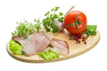 Ripe fresh ham with vegetables