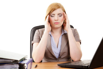 Businesswoman in the office has a headache