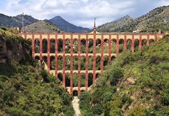 Naklejka premium Old aqueduct named El Puente del Aguila in Nerja