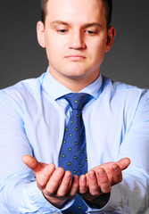 businessman is holding empty space