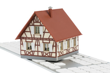 Wohnhaus auf Tastatur