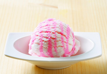 Scoop of white pink ice cream