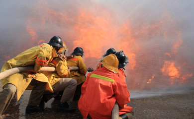 Firefighters fighting fire