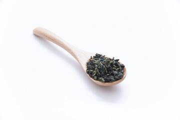 Chinese Tea (Tie Guan Yin) with wooden spoon on White Background
