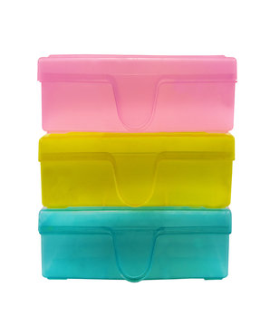 a pile of plastic containers on a white background