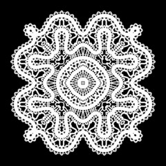 Realistic white lace doily on black