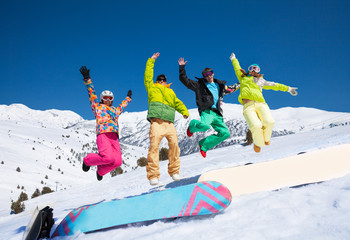 Jumping snowboarders