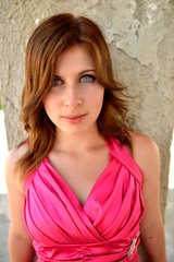 Fototapeta premium Young beauty wearing pink dress