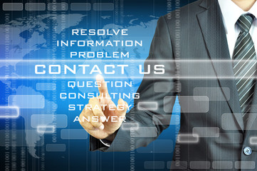 Businessman pressing Contact Us sign