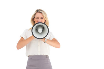 Businesswoman shouting through megaphone