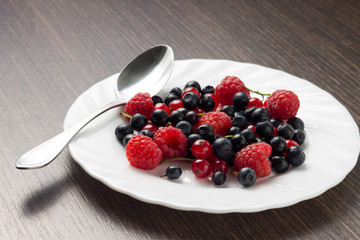 Frsh Berries in White Saucer with Spoon