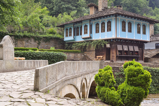 Old house and a stone bridge in the architectural complex Etara,