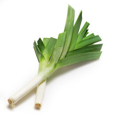 two leeks on white.