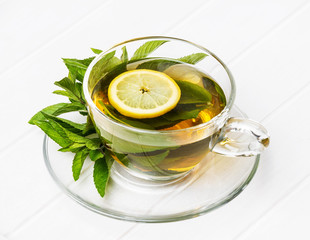 herbal mint tea on a white table - still life