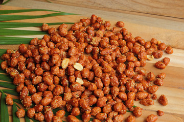 Coated nuts - peanuts, chocolate coated shocks.