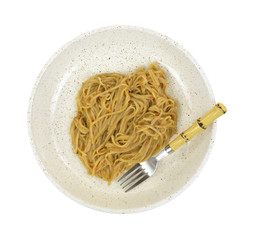 Szechuan noodles in bowl with fork