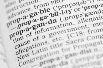Fototapeta premium Macro image of dictionary definition of propaganda