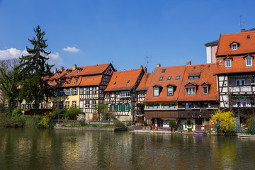 Half-timbered houses on a bank of stream in Bamberg, Germany.