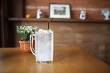 lychee soda on wood background